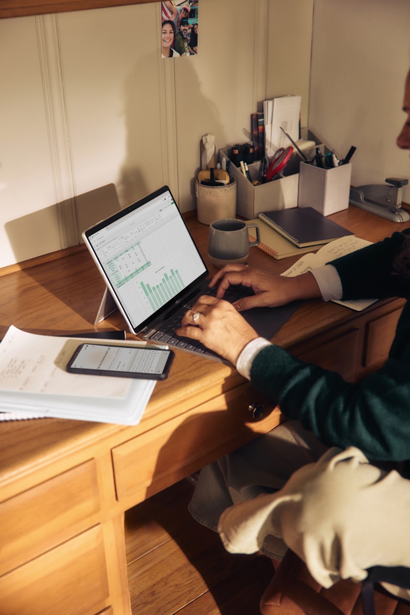 Finance professional working with spreadsheet data
